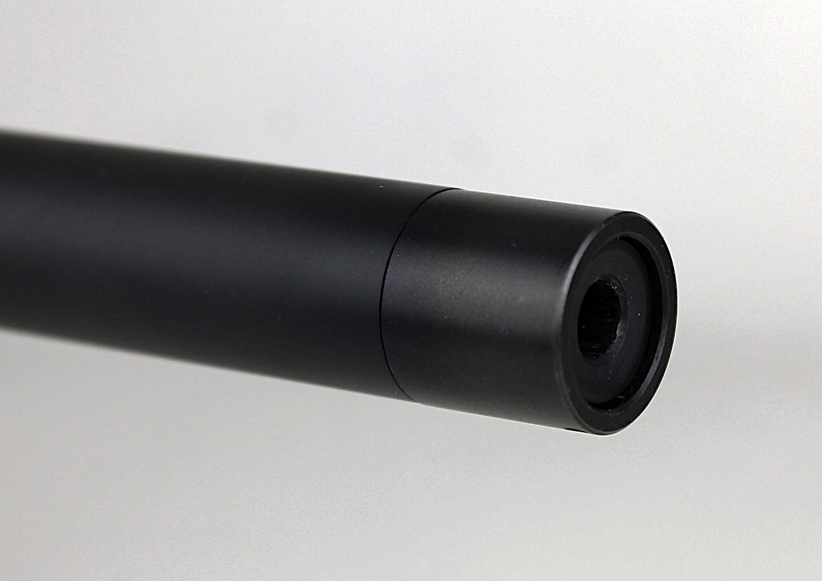 A steel thread protector extends slightly past the muzzle, creating an ersatz recessed crown.